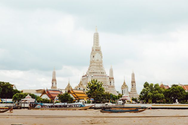 Taking a river cruise is a great way to see Wat Arun shine from the water.