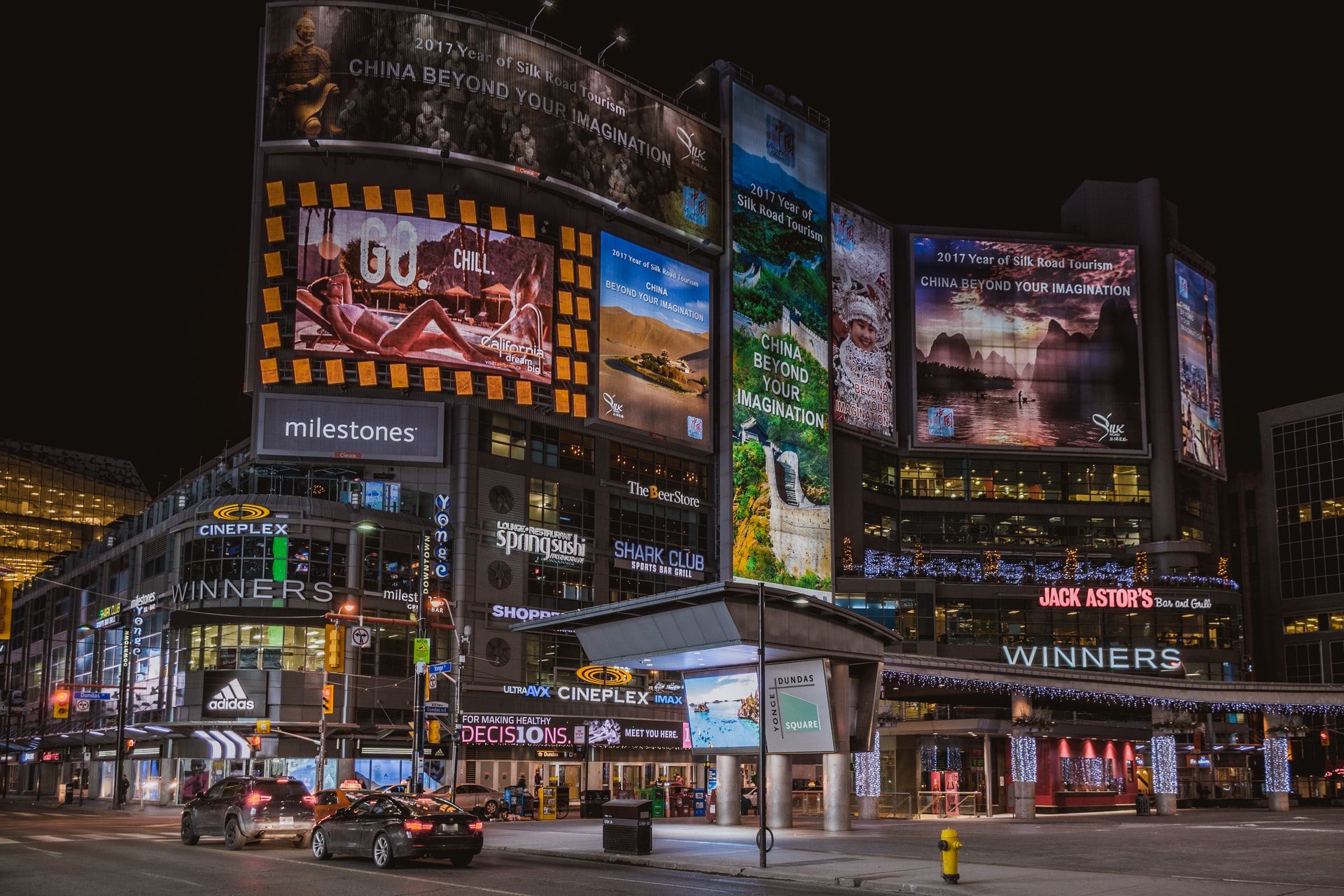 Another popular square in Toronto is Yonge-Dundas Square, often referred to as the Times Square of Canada. Yonge-Dundas Square is at the intersection of Yonge Street and Dundas Street in the heart of Downtown Toronto. It is much smaller than Times Square but holds a similar charm with its lit-up billboards and bustling atmosphere.