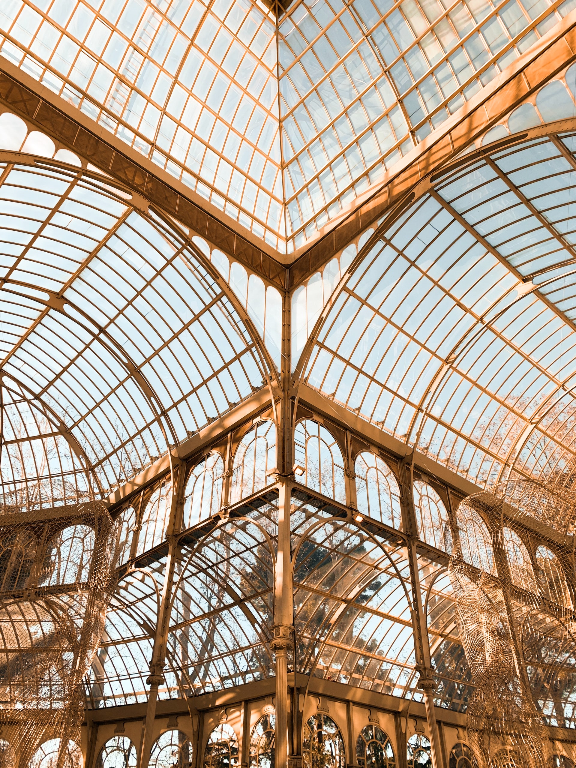 Palacio de Cristal is in El Retiro Park, but it’s so stunning we thought it deserved its own mention. The crystal palace is actually a greenhouse but its intricate design of iron and glass makes it feel like a palace.