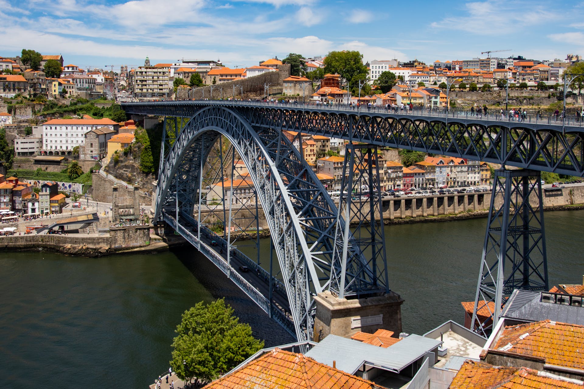 One of the best ways to see this iconic bridge is from the Cais de Riberia, which we’ll discuss next. You can also head up to the bridge with the Teleferico de Gaia, a cable car that will bring you up and take you back down to the waterfront.