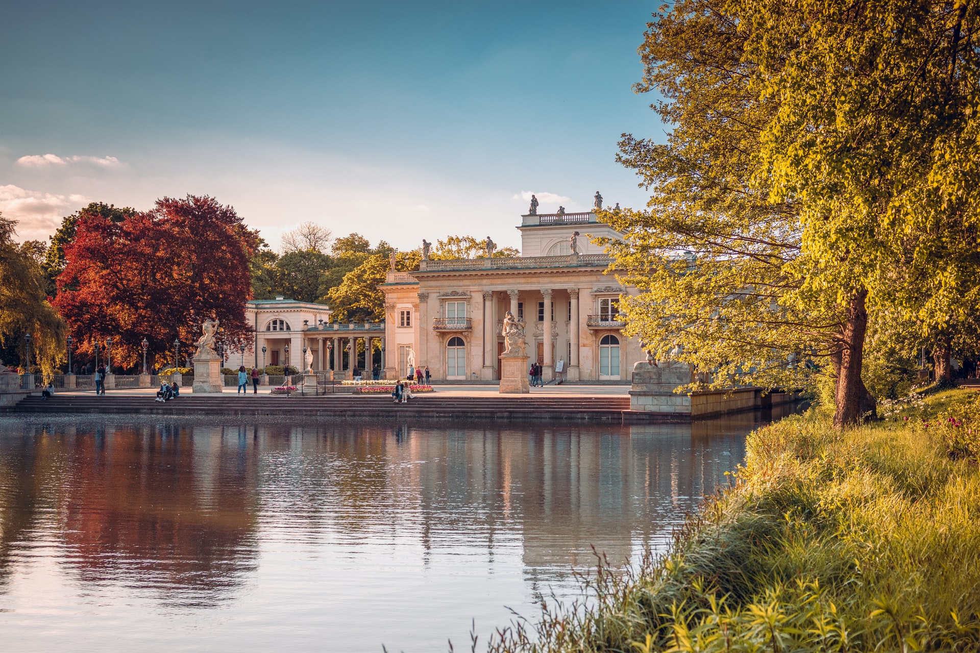 You will find the Royal Palace in Lazienki Park in the heart of Warsaw. Originally, there was an estate of woods, gardens, and an old castle before Stanislas II decided on renovations. He did not complete the work but gradually the whole complex developed. The Palace on the Isle that visitors see today dates back to the end of the 17th Century. It survived the War despite plans by the Germans to demolish it. They did however cause huge damage to the interior but annually over 2 million visitors see how the restoration has been a great success.